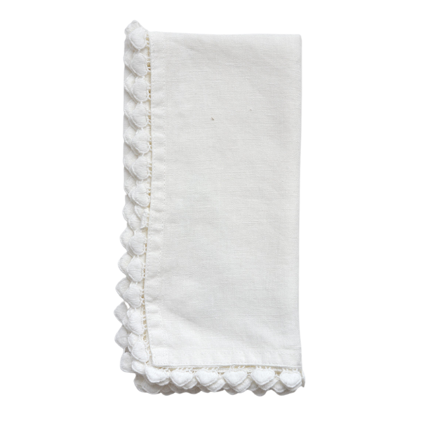 white hand towel with heart-shaped trim