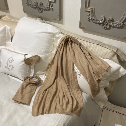 natural color cashmere travel set including a throw, an eye mask and a pillowcase