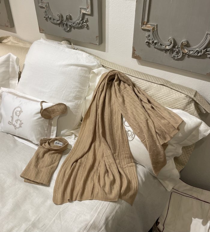 natural color cashmere travel set including a throw, an eye mask and a pillowcase
